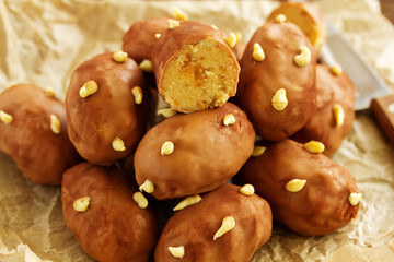 Chocolate cake with cream in the form of potatoes.