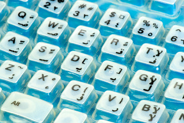 A soft blue keyboard Closeup photography