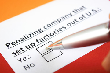 Obraz premium Penalizing company that set up factories out of U.S.: Yes or no?