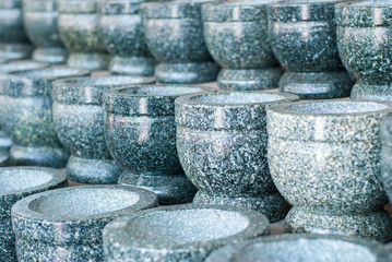 Naklejka premium Stone mortars lined up in front of the Angsila shop. Chonburi Province