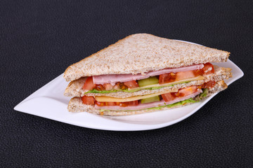 Club sandwich with ham and cheese