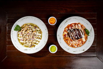 red and green chilaquiles with beef jerky and chicken