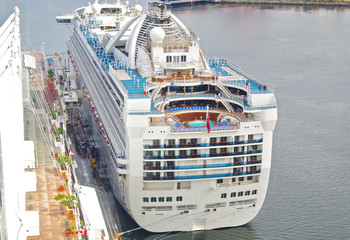 Birdseye view onto modern white Princess Crusies cruiseship or cruise ship liner in port of...