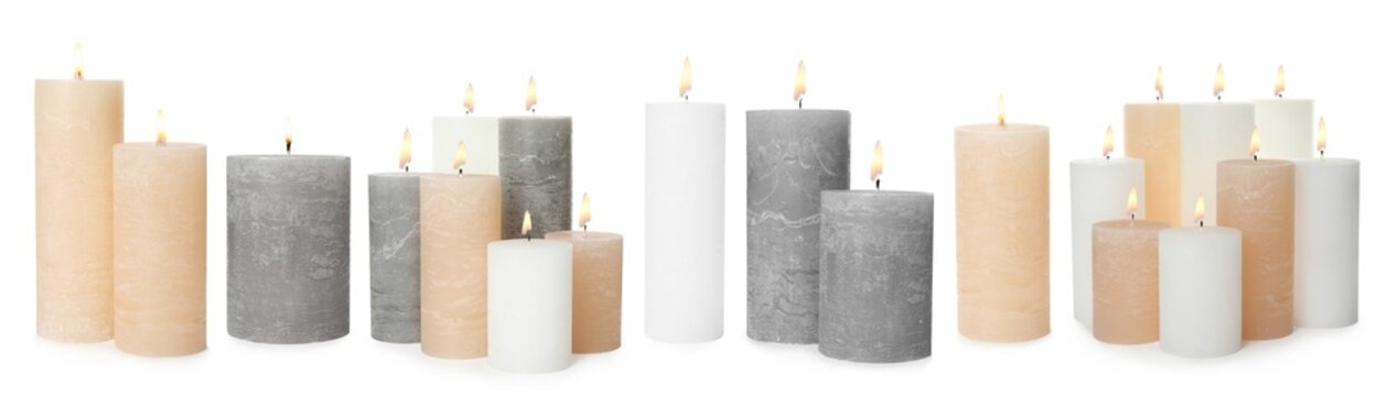 Set of burning color candles on white background. Banner design