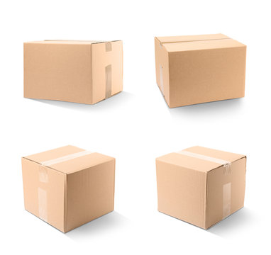 Set of closed cardboard boxes on white background