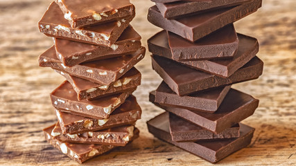 pieces of different milk chocolate are neatly arranged in columns