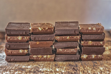pieces of different milk chocolate are carefully laid out in a staggered order