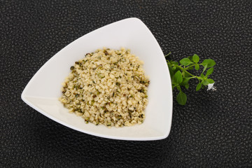 Peeled hemp seeds in the bowl