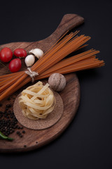 Fototapeta na wymiar Pasta, walnut, garlic and tomato. 