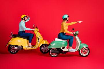 Profile side view of her she his he nice attractive cheerful cheery couple tourists riding moped...