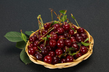 Sweet ripe cherry with leaves