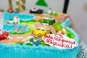 Fototapeta na wymiar cake for a boy 3 years, торт для мальчика 3 года, cake, food, cupcake, sweet, birthday, dessert, cupcakes, colorful, party, baked, celebration, icing, christmas, cookies, sprinkles, pink, candy, white