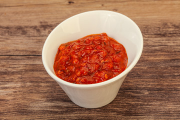 Tomato spicy sauce in the bowl