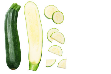 fresh green zucchini with slices isolated on white background. top view