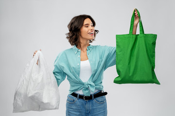 consumerism, sustainability and eco living concept - portrait of happy smiling young woman in...