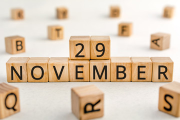 November 29 - from wooden blocks with letters, important date concept, white background random...