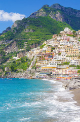Breathtaking and beautiful view of Positano town and Spiaggia beach at famous Amalfi Coast in Italy...