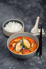 Tom yum soup with seafood rice in the decor