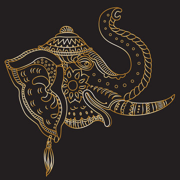 Vector decorative fantasy ornate Indian elephant head silhouette. Hand drawn doodle sketch. Golden contour thin line, ethnic ornaments on a black background. T-shirt print. Batik paint. Book cover