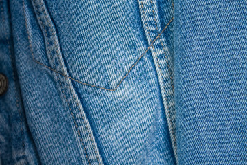Naklejka premium Jeans and denim jacket close-up in blue with straight seams. Wardrobe Update. Top view. Flat lay composition