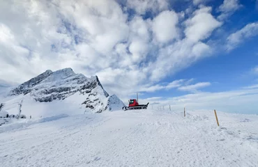 Fotobehang The Top Of Jungfraujoch Mountain In Switzerland. Jungfraujoch Is A Saddle In The Bernese Alps That Connecting The Two Four Thousander Peaks Jungfrau And Mönch © Saman Weeratunga