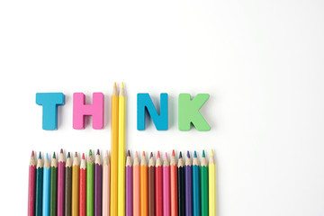 ' THINK '  Wooden Letters, Color Pencil Instead ' I ' Letter with Multicolored Pencil on White Background, Think Positive, Creative, Mindset and Inspiration 