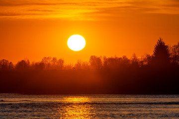 Sunset on the lake. Pskov region. Russia