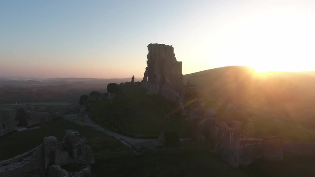 Corfe Castle Ruins at Sunset Dorset England Drone Aerial Footage