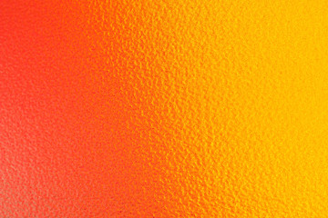 The background is orange shading to a deep yellow