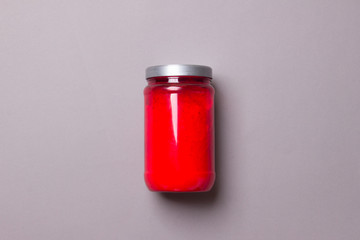 red bank with powder on grey colored paper background