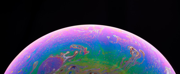 Soap bubble isolated on black