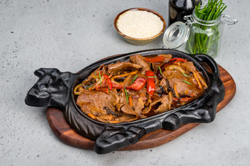 Beef with vegetables on a tray in the form of a cow