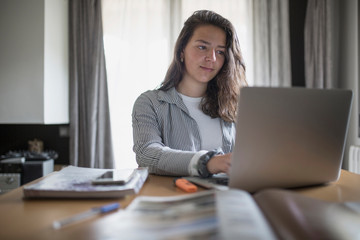 Girl studying and working at home