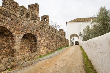 a street at Convent of Saudação and tumular arcs - castle of Montemor-O-Novo, District of Evora, Alentejo, Portugal