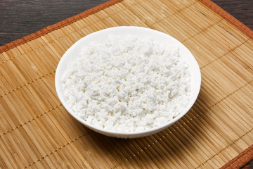 bowl with cottage cheese on the table