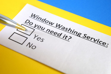 One person is answering question about window washing service