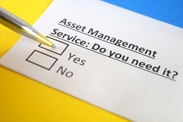 Obraz premium One person is answering question about asset management service.