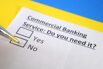 One person is answering question about commercial banking service.
