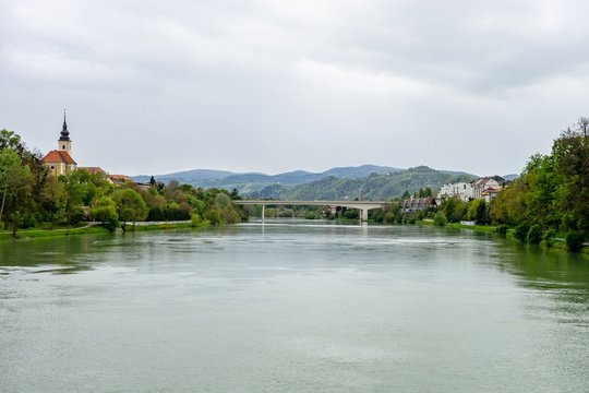 Landscape of Slovenia in Maribor with Drava river. there is Koroski most and Kapucinski samostan church in background taken from Studentska brv