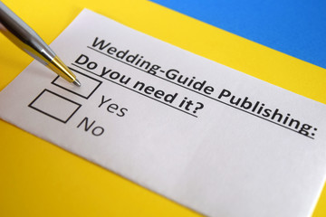 Fototapeta premium One person is answering question about wedding guide publishing.