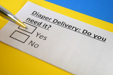 Fototapeta premium One person is answering question about diaper delivery.