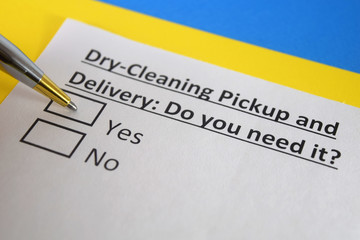 One person is answering question about dry cleaning pickup and delivery. © Richelle