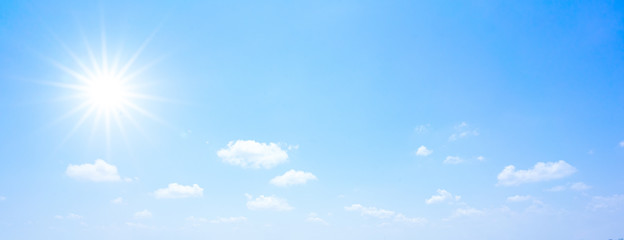 Naklejka na ściany i meble Beautiful fluffy sky with energetic sun in the summer