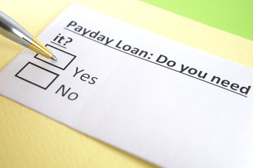 Fototapeta premium One person is answering question about payday loan.