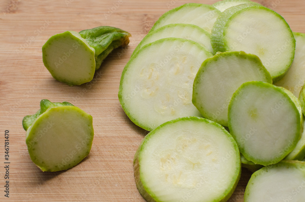 Wall mural sliced zucchini for cooking, delicious food at home, diet menu