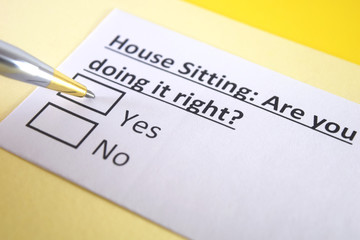 One person is answering question about house sitting.