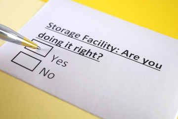 Obraz premium One person is answering question about storage facility.