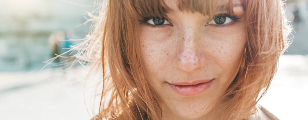 Portrait close up of a beautiful caucasian woman outdoor
- 346784457