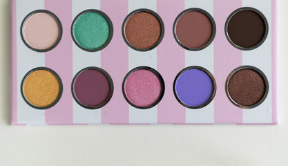 eye shadow palette, cosmetic containers, mockup, blank label for mockup, horizontal orientation, copy space