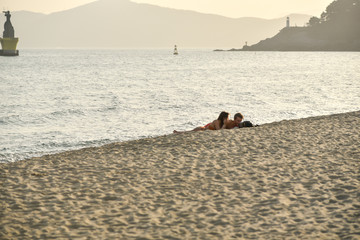 Couples on the beach of Haeundae Beach.